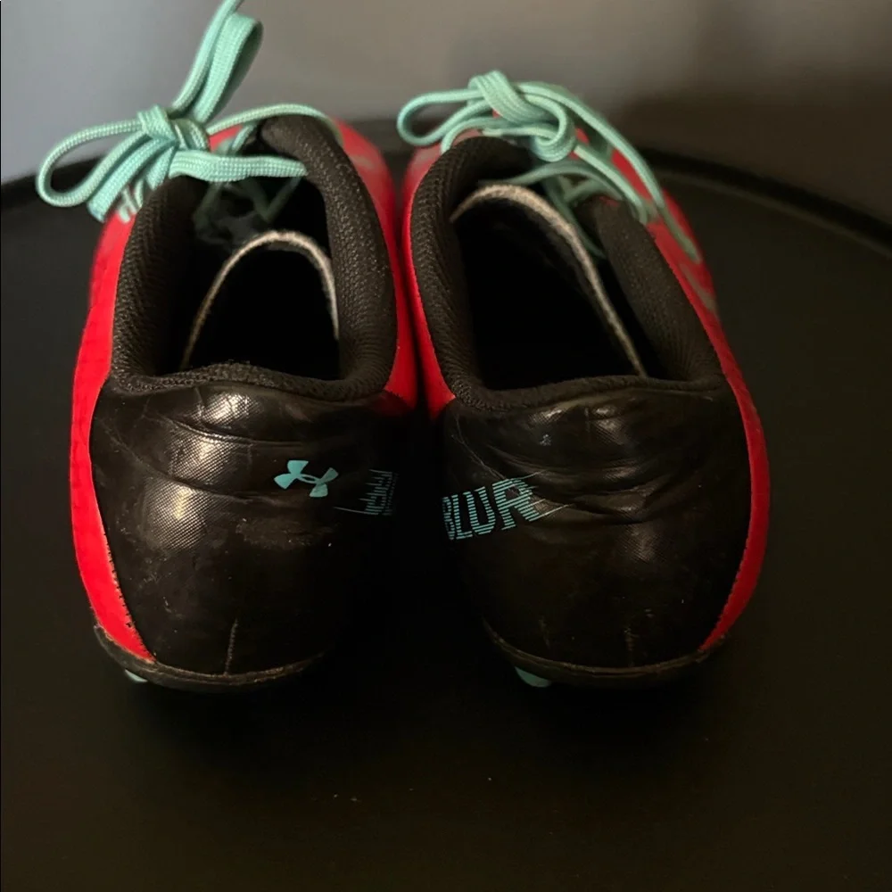 Under Armour size 1 Red and Teal Soccer Cleats